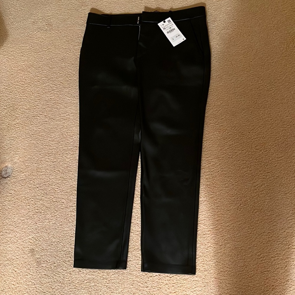 - Black leather pants from Zara
